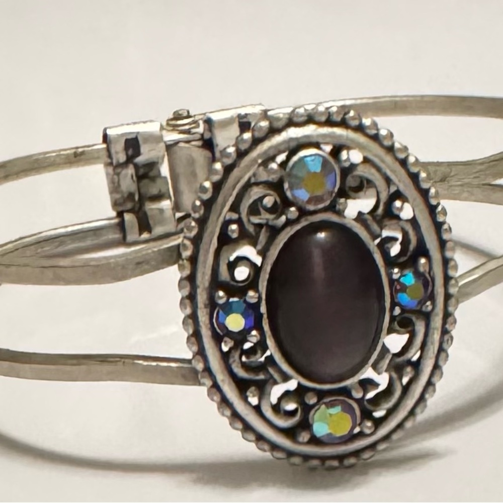 Ornate Silver Bracelet with Black and Silver Details